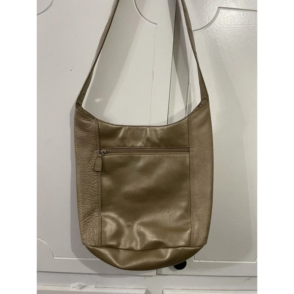 The SAK Gold Pebbled Leather Hobo Shoulder Bag Purse Single Strap Handbag